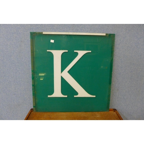 407a - A Perspex 'K' sign