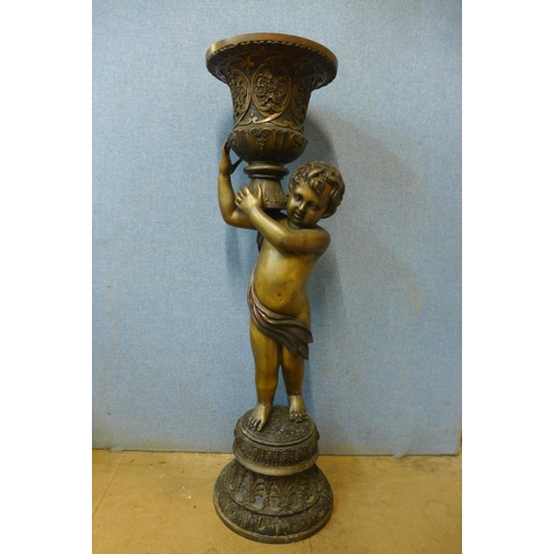 418 - A large French style bronze figural cherub urn, 125cms h