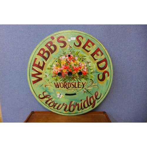 426 - A painted wooden Webbs Seeds advertising sign