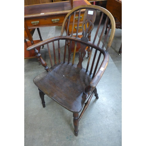 50 - A 19th Century yew wood and elm Windsor chair