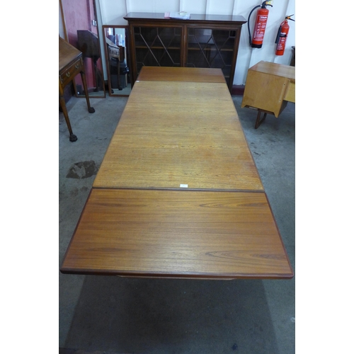 58 - A G-Plan teak Danish Design extending dining table, designed by Ib Kofod Larsen