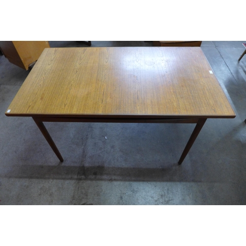 58 - A G-Plan teak Danish Design extending dining table, designed by Ib Kofod Larsen