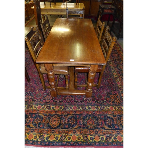 6 - A Titchmarsh & Goodwin Ipswich oak refectory table and six RL8256 model chairs