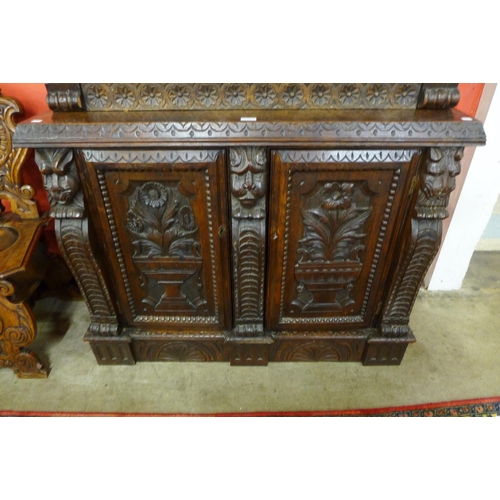 7 - A Victorian Elizabethan Revival carved oak bookcase