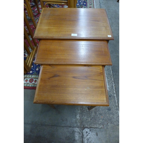 79 - A teak nest of tables