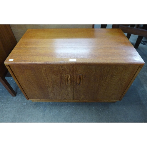 86 - A G-Plan Fresco teak two door cupboard