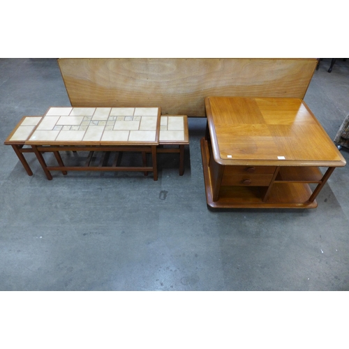 89 - A Nathan teak Pandora's Box coffee table and a teak tiled top nest of tables