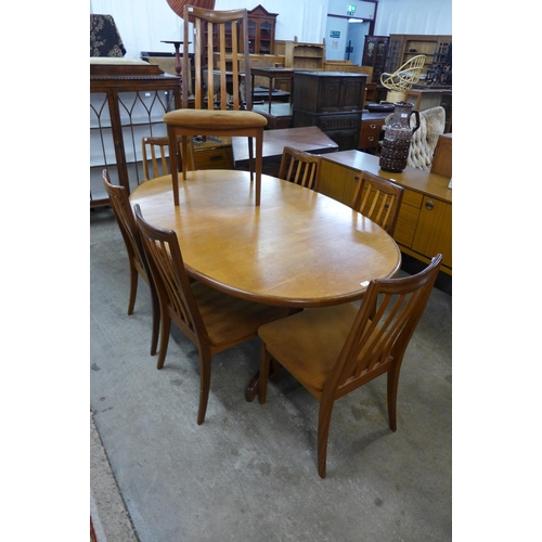 97 - A G-Plan Fresco teak extending dining table and seven chairs