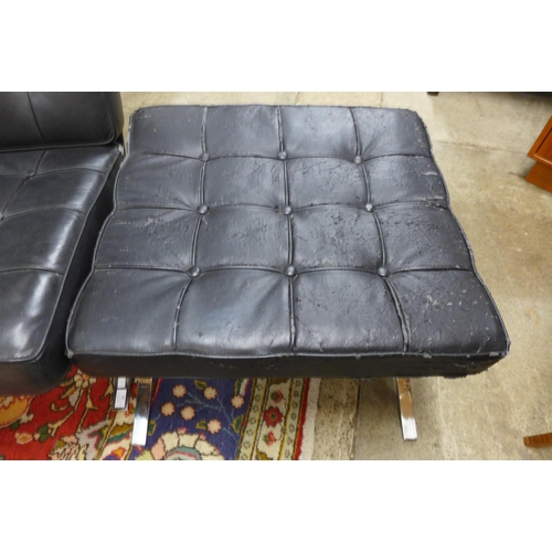 98 - A Barcelona style chrome and black leather sofa and footstool