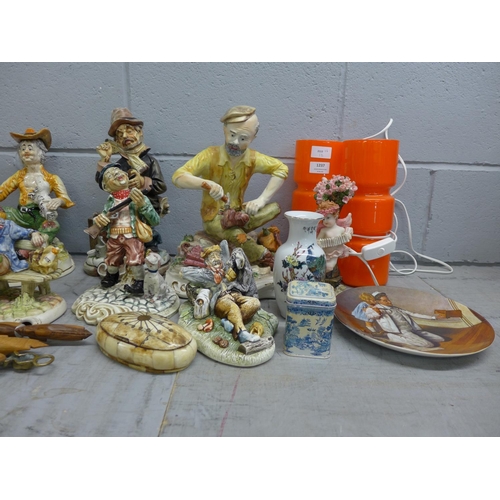 1237 - Capodimonte style figures and other china and two orange glass table lamps and a carriage and mantel... 