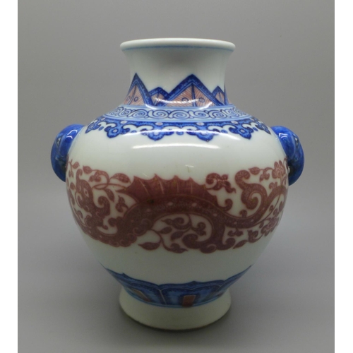 609 - A 20th Century Chinese vase with elephant handles, 15.5cm