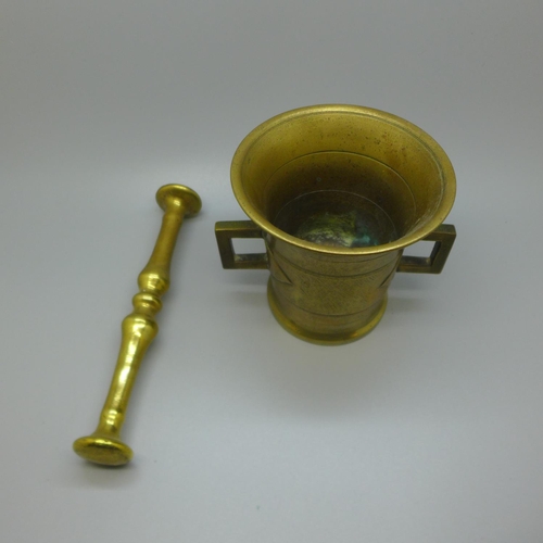 639 - A bronze pestle and mortar