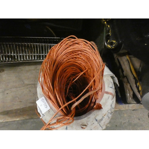 2081 - Large reel of orange agricultural twine/bale cord with a wood 4ft 6