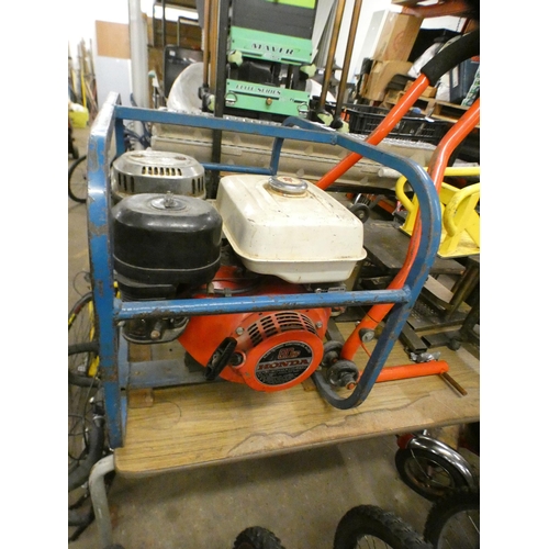 2091 - Honda framed twin outlet petrol-driven generator - W