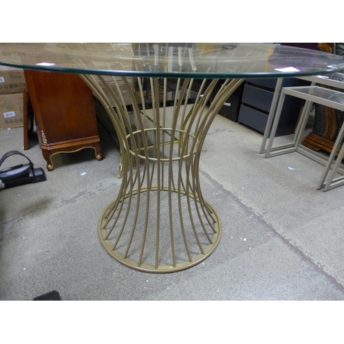 1726 - A Westwood gold and glass circular dining table * this lot is subject to VAT