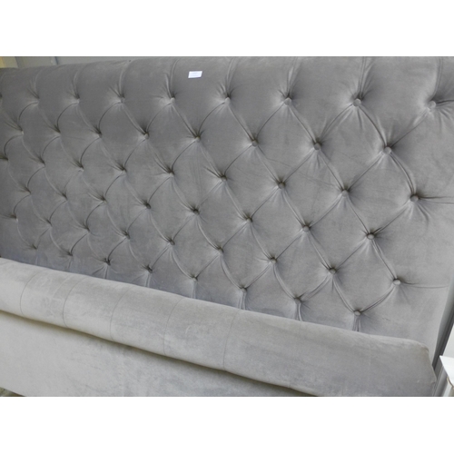 1727 - A grey upholstered kingsize button back bed frame (missing fixings )