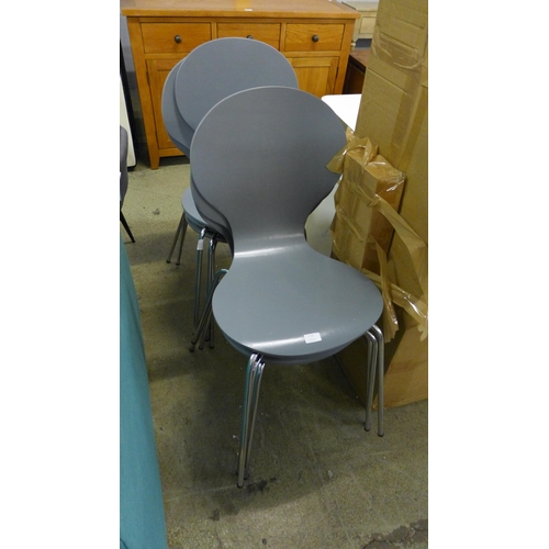 1750 - A set of six grey painted dining chairs with metal legs