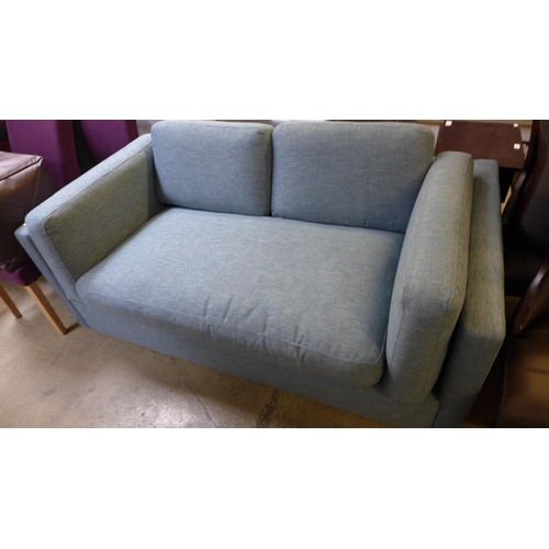 1758 - A blue fabric two seater sofa bed