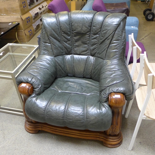 1764 - An oak and leather chair