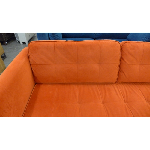 1301 - A designer orange velvet upholstered three seater sofa - Ex display