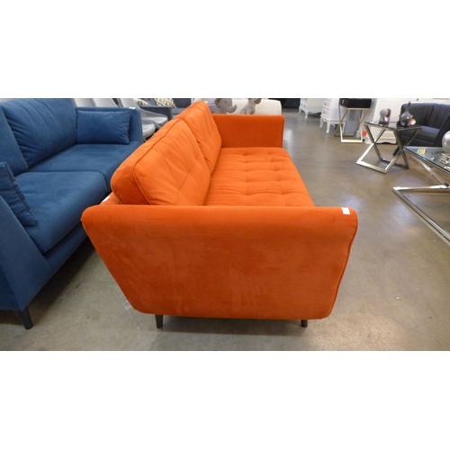 1301 - A designer orange velvet upholstered three seater sofa - Ex display