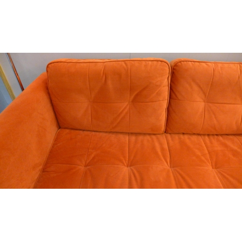 1302 - A designer orange velvet upholstered two seater sofa - Ex display