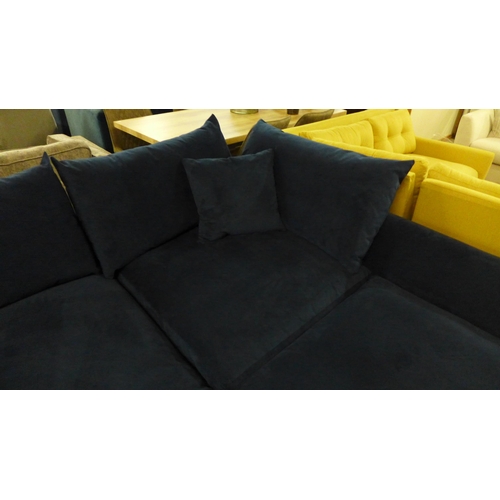 1308 - A designer dark blue upholstered corner sofa (ex-display)