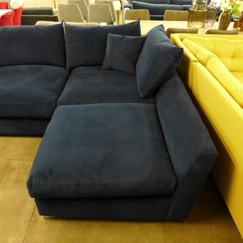 1308 - A designer dark blue upholstered corner sofa (ex-display)