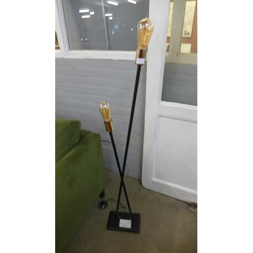 1337 - A black filament crossover floor lamp, H 127cms (27938)   #