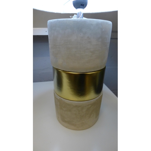 1362 - A concrete base table lamp with a decorative gold band and linen shade, H 63cms (70316743)   #