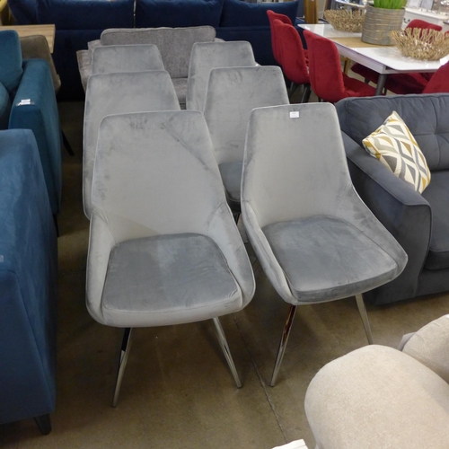 1403 - A set of six light grey velvet dining chairs on chrome legs *This lot is subject to VAT