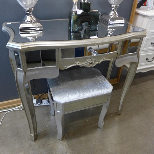 1500 - A mirrored dressing table/desk with stool