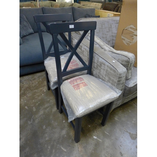 1551 - A pair of blue painted and upholstered cross back dining chairs