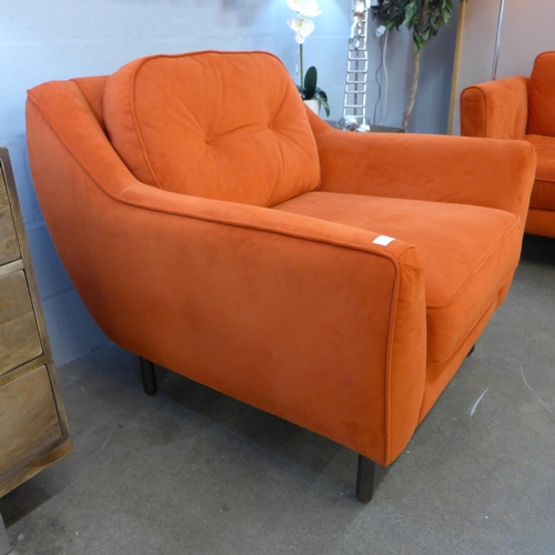 1303 - A designer orange velvet upholstered armchair -  Ex display