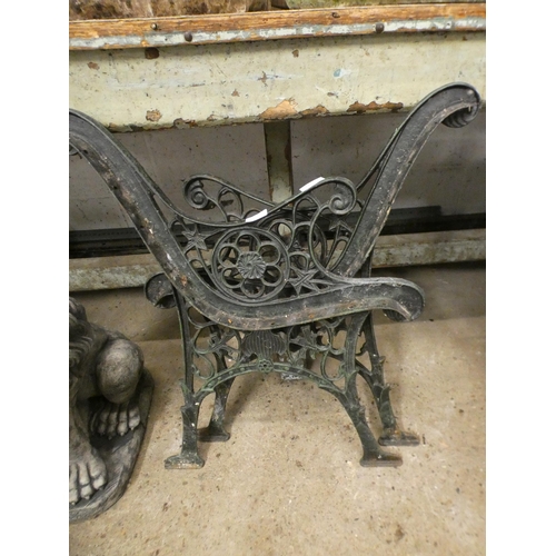 2429 - Pr. of cast metal bench ends