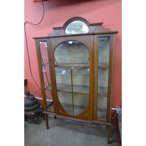 599 - An Edward VII inlaid mahogany display cabinet