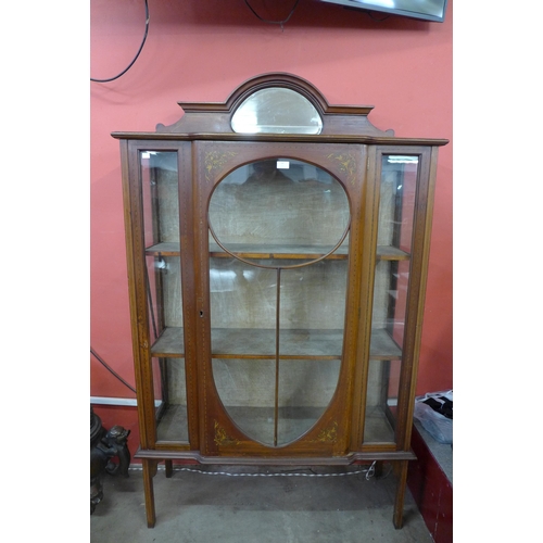 599 - An Edward VII inlaid mahogany display cabinet