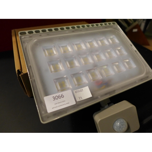 3066 - An LED motion sensor light with wall mounting bracket