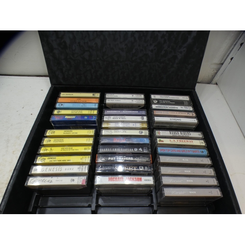 2298 - Approx. 30 cassettes & 7 LPs, Iron Maiden & AC/DC in cassette case