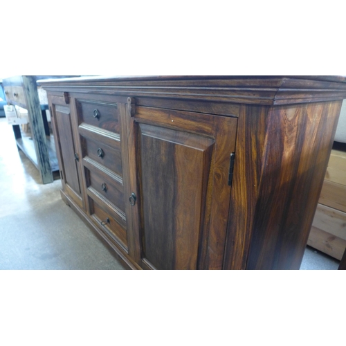 1336 - An Indian hardwood two door four drawer sideboard *This lot is subject to VAT