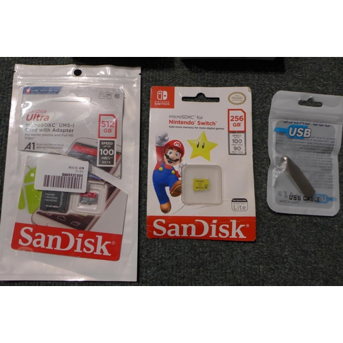3089 - 2 i12 wireless ear buds, a 1TB USB flash drive and two Sandisk micro SD cards: 512gb & 256gb