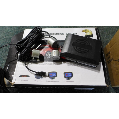 3111 - A Car Distance Detection System and a 14.4v power tool battery