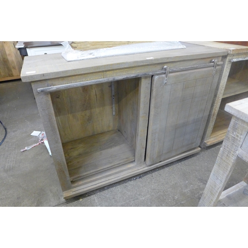 1584 - A rustic timber sideboard with wine rack *This lot is subject to VAT