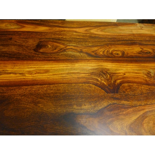 1339 - An Indian hardwood TV stand *This lot is subject to VAT