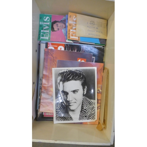 753 - A collection of Elvis Presley memorabilia, including signed postcards, a large poster, a membership ... 