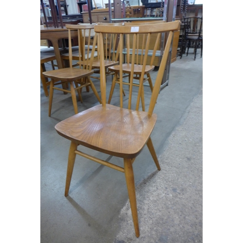 57 - A set of four Ercol Blonde elm and beech 391 model chairs