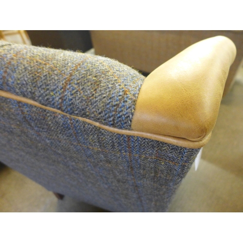 1329 - A Chester Harris Tweed and Cerato leather wing back  armchair - small cut in leather as per photogra... 