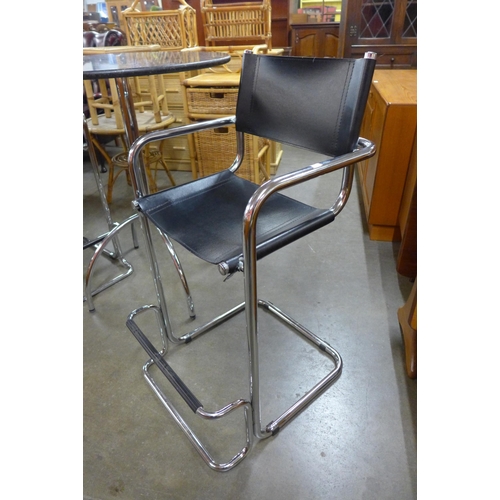 105 - A pair Bauhaus style chrome and black leather cantilever bar stools and a chrome and granite topped ... 