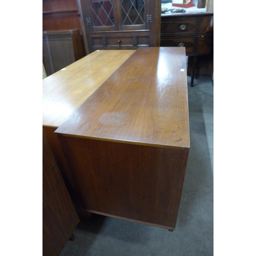 110 - A teak sideboard