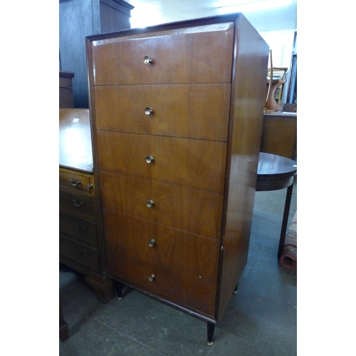 112 - A teak chest of drawers